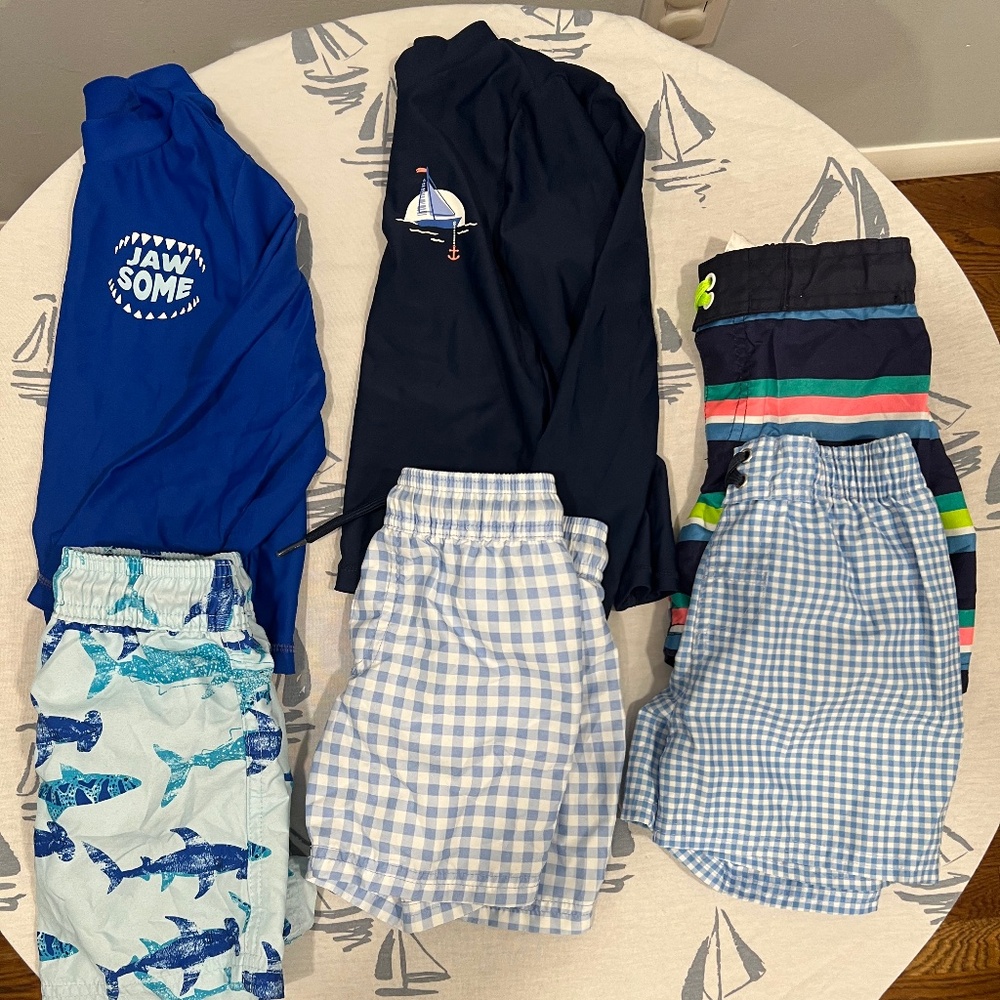 2 t bathing suits 5 short bathing suits and 2 long sleeve rash guards
